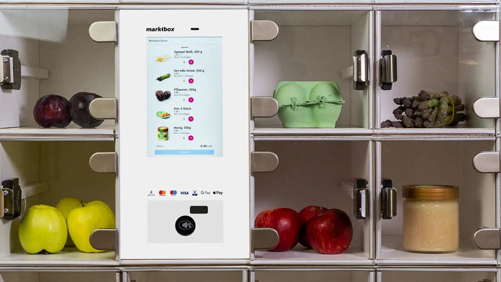 Marktbox-Automat mit digitalem Touchscreen und Fächern für frische Lebensmittel wie Obst, Gemüse und Eier