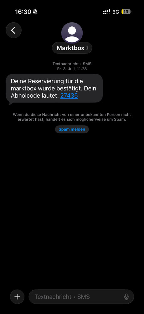 Bestätigungs-SMS der marktbox mit dem Abholcode