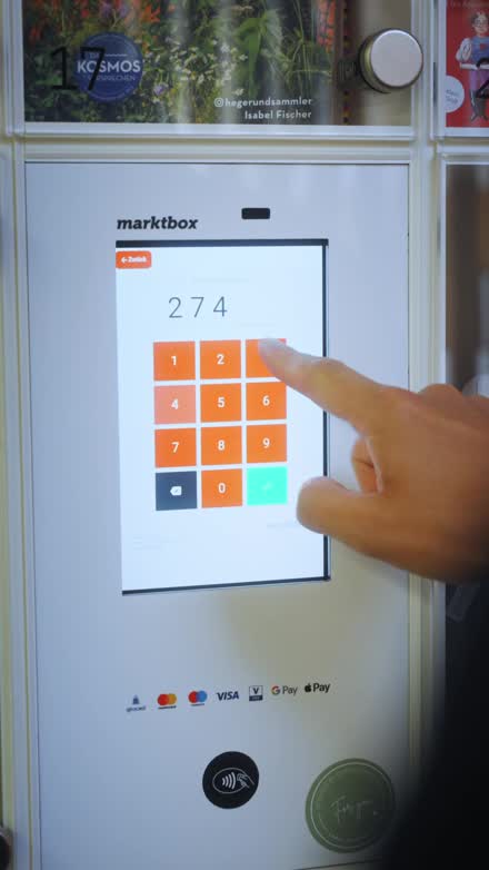 Abholcode am Touchscreen des Verkaufsautomaten eingeben